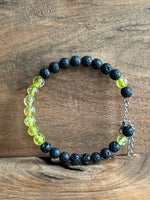 Load image into Gallery viewer, Aurora Glass | Light Green &amp; Lava Stone Aromatherapy Diffuser Bracelet

