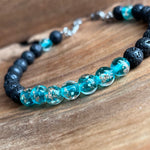 Load image into Gallery viewer, Aurora Glass | Light Blue &amp; Lava Stone Aromatherapy Diffuser Bracelet
