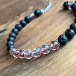 Load image into Gallery viewer, LJ Turtle Aromatherapy bracelets Glow-in-the-Dark Pink Glass Beads and Lava Bead Essential Oil Bracelet
