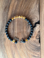 Load image into Gallery viewer, LJ Turtle Aromatherapy bracelets Medium Glow-in-the-Dark Yellow-Orange Glass Beads and Lava Bead Essential Oil Bracelet
